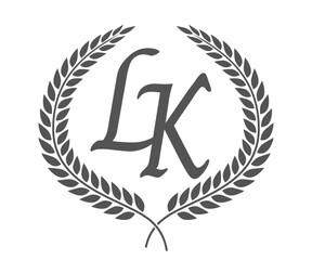 Initial letter L and K, LK monogram logo design with laurel wreath. Luxury calligraphy font.