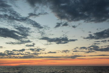 Ocean Sunset with Vibrant Sky and Clouds