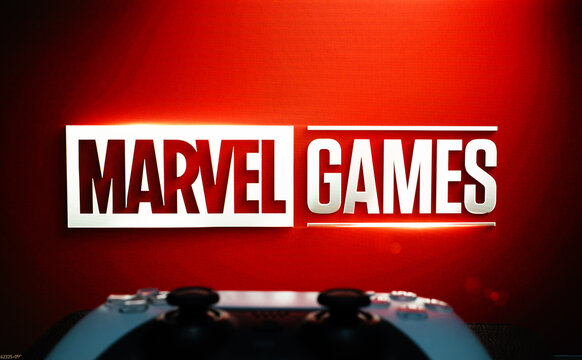 London, UK, 01.17.2025: Marvel Games logo on the desktop screen with PS5 game controller