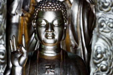 Phuoc Duyen buddhist pagoda. Golden Buddha statue. Akasha mudra. Gesture of space.  Hue. Vietnam.