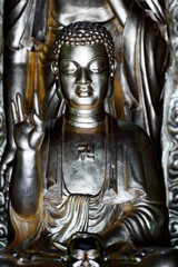 Obraz premium Phuoc Duyen buddhist pagoda. Golden Buddha statue. Akasha mudra. Gesture of space. Hue. Vietnam.
