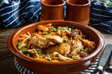 Fried chicken fillet with vegetables.