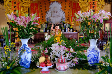 Long Duc buddhist Pagoda.  Infant Buddha statue pointing the north. On Vesak Day, Buddhists  commemorates: the birth, enlightenment and the death of Buddha Gautama. Tan Chau. Vietnam.