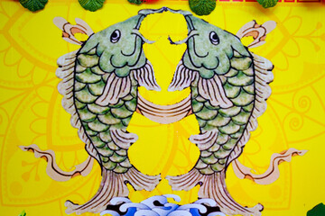 Phuoc Long Buddhist pagoda. Two chinese fishs.  Tan Chau. Vietnam.