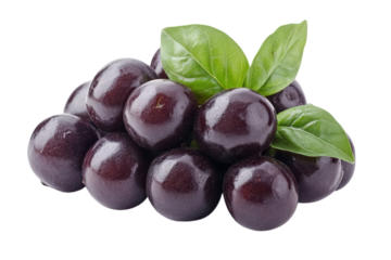 Fresh purple grapes with green leaves arranged in a pile for a healthy snack or dessert idea