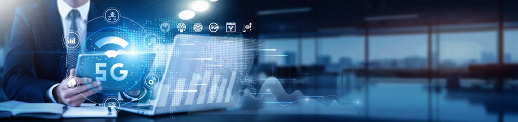 A 5G technology professional using a tablet with a digital interface overlay showing network speed, connectivity data, and technology graphs such as signal strength, bandwidth, latency, coverage.