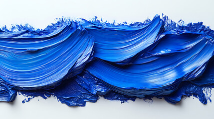 Vibrant, textured application of blue paint on a white surface, resembling ocean waves due to the thick, sweeping brushstrokes