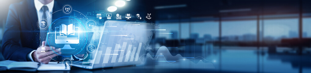 E-learning professional using a tablet with a digital interface overlay showing interactive courses, student progress, and technology graphs tracking performance, analytics, data visualization.