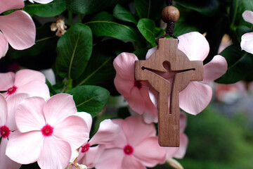 Pray in nature. Rosary on a natural plant..