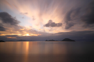 sunset on the beach. Seaside town of Turgutreis and spectacular sunsets. Selective Focus. Long Exposure shoot. tranquility scene.