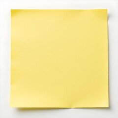 Blank yellow sticky note on a white background