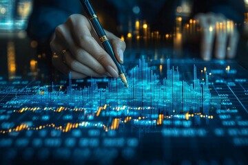Business analyst examining financial data and stock market trends on blue graphs and charts 