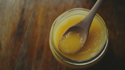  Purely Made: Homemade Ghee in a Jar with Wooden Spoon

