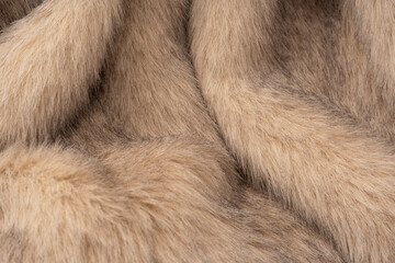 Texture of faux fur as a background, top view.