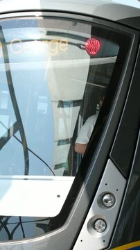 Vancouver Sky Train. The Skytrain elevated light rapid transit system crossing over a busy street, Vancouver, BC, Canada 