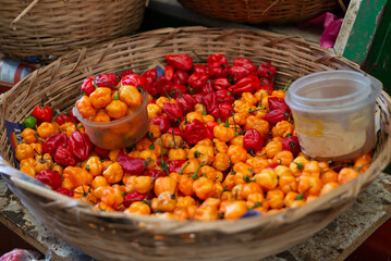 Peppers at a sales stand. Plant with a hot and spicy flavor. Fruit, seed or condiment.