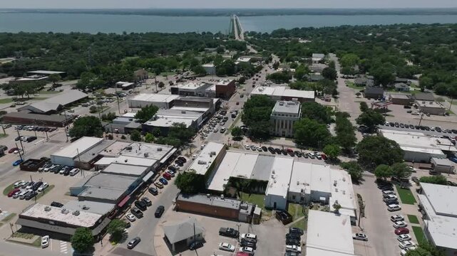 Downtown Rockwall, Texas with Highway 66 bridge going over Lake Ray Hubbard aerial drone 4k 60fps