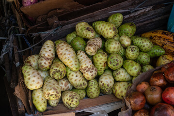 Exotic fruits for sale at a stand. Healthy food concept.