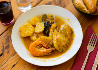 Bowl of traditional catalonian meal Casuela de San pedro
