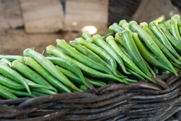 Green okra for sale at a market. Vegetable rich in fiber.