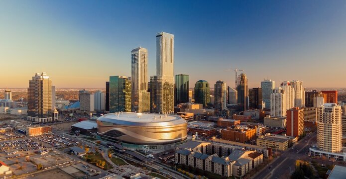 Edmonton skyline at sunrise, featuring Rogers Place arena. Modern architecture and urban development. Downtown, Edmonton, Alberta, Canada