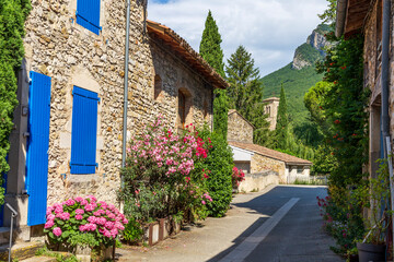 Fototapeta premium Saou, in the Drôme department, southeastern France, door of Provence. The town offers traditional architecture with its narrow medieval streets and houses under synclinal of Saoû mountain.