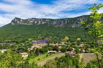 Obraz premium Saou, in the Drôme department, southeastern France, door of Provence. The town offers traditional architecture with its narrow medieval streets and houses under synclinal of Saoû mountain.