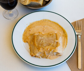 Popular meat dish of Italian cuisine is lasagna with veal under a delicious sauce and cheese sprinkled on top