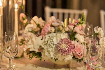 Wedding bouquet of pink flowers. wedding table decor. festive table setting. festive table decoration.