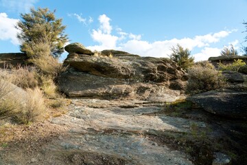 Giant Rock on a Scenic Hilltop Landscape