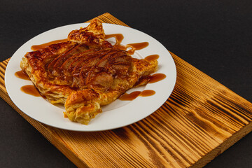 Repotting plants on a sunny balcony with care and attention