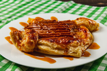 Beautiful night sky with moon partially hidden by clouds over Lviv Ukraine