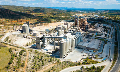 Top view of a cement factory near the city Bunol. Spain. High quality photo © JackF