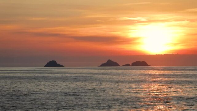 sunset at arpoador beach in rio de janeiro.