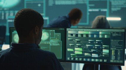 Governmental hackers working together on digital security and cyber defense measures. Engaging in...