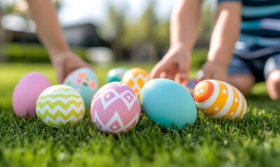 Easter egg hunt. Children searching for colorful Easter eggs in grass.