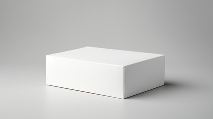 Bo&icirc;te blanche en carton pos&eacute; sur un fond neutre. Mock-up pour marque, entreprise. Objet, colis, emballage. Commerce, entrep&ocirc;t. Pour conception et cr&eacute;ation graphique.