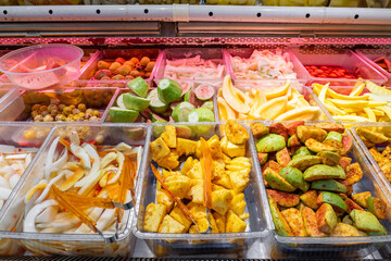 street stall sells different fruit slices