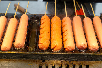 grilled sausages at a street stall