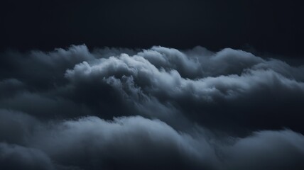 Obraz premium Dramatic dark clouds swirl in a moody, atmospheric sky, creating a mesmerizing pattern of shadows and light.