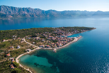 Naklejka premium Scenic Aerial View of Sucuraj Town on Hvar Island, Southern Croatia. Pristine Beaches, Mediterranean Charm, and Adriatic Sea