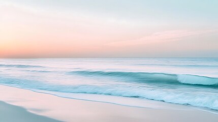 Fototapeta premium Serene sunrise over ocean waves, sandy beach. Peaceful coastal scene, ideal for travel brochures
