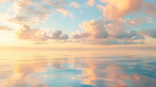 Golden clouds drifting above a calm ocean at sunrise, with the soft light creating a beautiful reflection on the water
