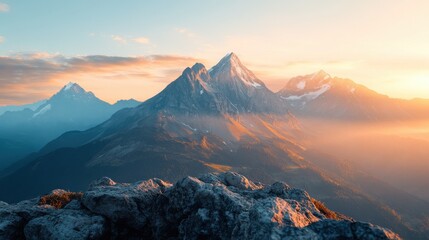Mountain landscape at sunrise with peaks and bokeh foreground