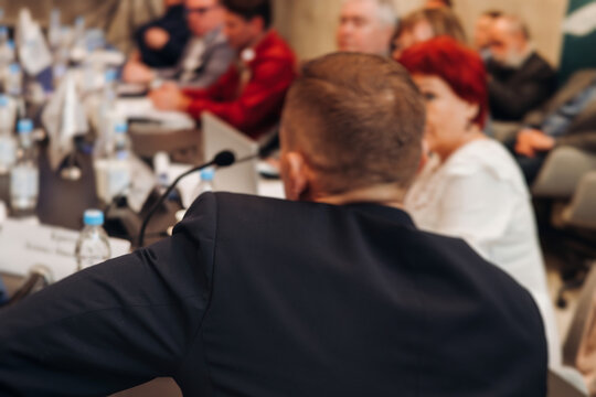 Board of directors in meeting room, Company executive director and management at the table, global corporation boss, parters team and investors, CEO back view, discussing project and planning strategy