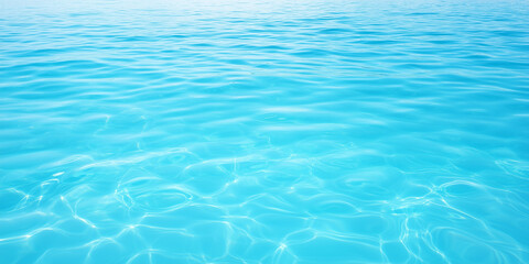 Obraz premium Crystal clear turquoise water with gentle ripples reflecting light.