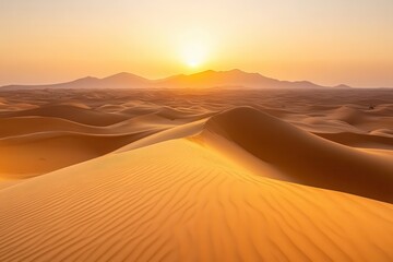 Serene Sunset Over Golden Sand Dunes with Gentle Curves and Mountains in Background, Capturing the Tranquility of Nature&rsquo;s Landscape at Dusk