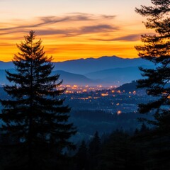 Fototapeta premium Twilight Glow over Mountain City with Twinkling Lights on Horizon
