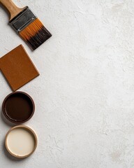Paint samples and brush on white background