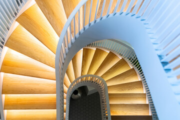 Fototapeta premium Spiral staircase inside modern building